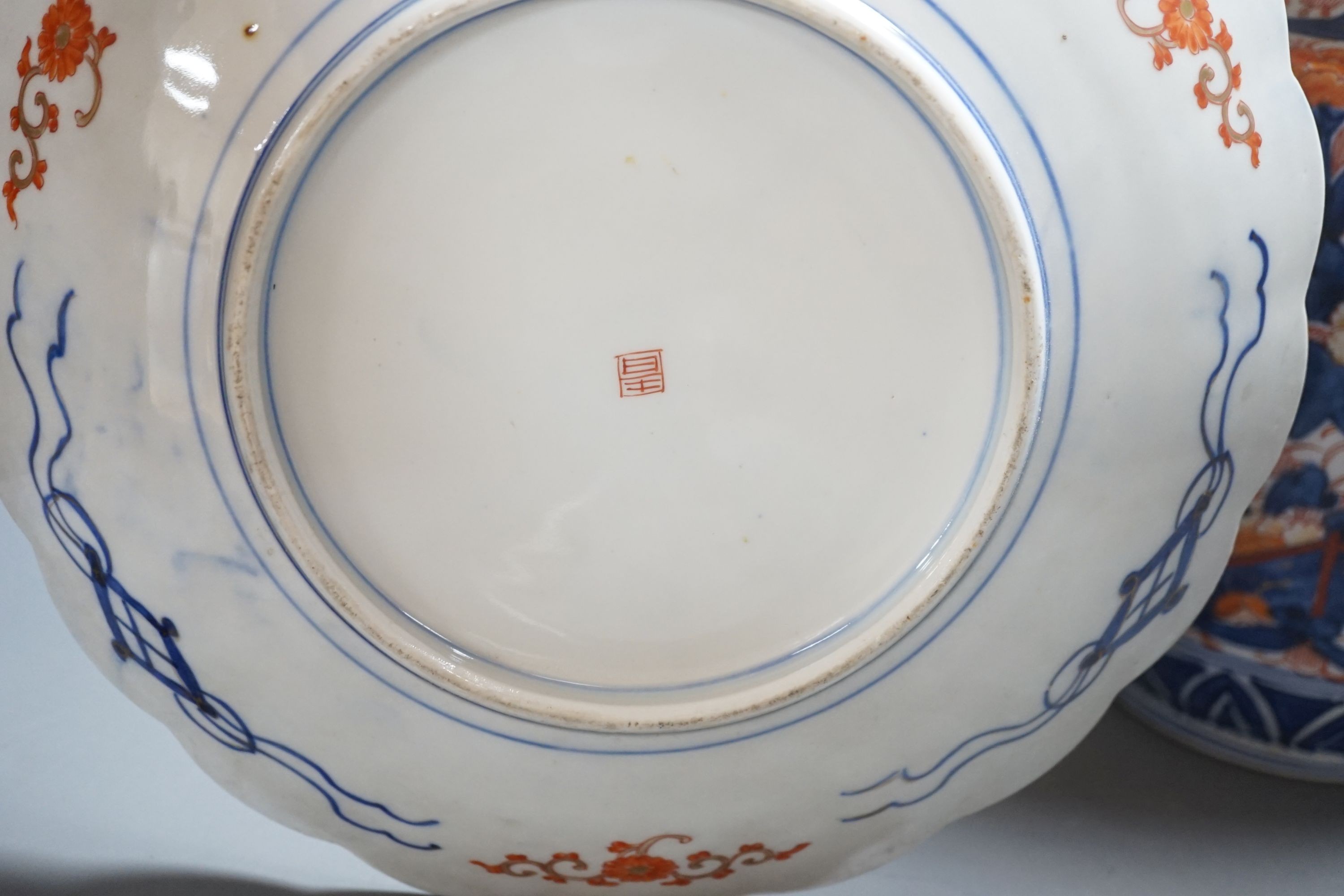A Japanese Imari vase, 31cm tall, and an Imari dish